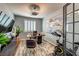 Bright office space with wood floors, contemporary decor, and an exercise bike at 280 Via Del Duomo, Henderson, NV 89011