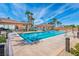 A community pool with a shaded pavilion and lounge chairs for relaxing at 280 Via Del Duomo, Henderson, NV 89011