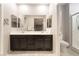 Spacious bathroom with double sink vanity, large mirror, and a separate shower stall at 2860 Sunflower Days Ave # 2141, North Las Vegas, NV 89031