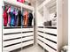 Walk-in closet with custom shelving, drawers, and ample storage for an organized wardrobe at 2860 Sunflower Days Ave # 2141, North Las Vegas, NV 89031