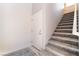 Bright entryway features tile flooring, a stairway, and a white door with modern hardware at 2860 Sunflower Days Ave # 2141, North Las Vegas, NV 89031