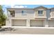 Desirable two-story townhome featuring a private balcony and convenient two-car garage at 2860 Sunflower Days Ave # 2141, North Las Vegas, NV 89031