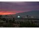 Stunning city view featuring the illuminated Las Vegas skyline with mountain backdrop at 2862 Athens Ridge Dr, Henderson, NV 89052