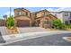 Charming two-story home with a desert landscape, paved driveway and two-car garage at 2862 Athens Ridge Dr, Henderson, NV 89052
