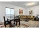 Cozy living area with comfortable seating, a decorative rug, and ample space for relaxation and gatherings at 2862 Athens Ridge Dr, Henderson, NV 89052