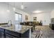 Open concept kitchen and living area with hardwood style floors, perfect for modern living at 2862 Athens Ridge Dr, Henderson, NV 89052