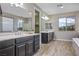 Large bathroom with double vanities and plenty of counter space, with a tub, and a walk-in shower at 2862 Athens Ridge Dr, Henderson, NV 89052