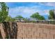 The block wall is high, but can't block this gorgeous view of the city in the distance at 2862 Athens Ridge Dr, Henderson, NV 89052