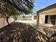 A look at the backyard, showing the home's patio and pool at 316 Lingering Ln, Henderson, NV 89012