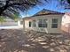 House with a patio leading out to the backyard at 316 Lingering Ln, Henderson, NV 89012