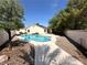 Backyard featuring a pool, patio, and gravel at 316 Lingering Ln, Henderson, NV 89012