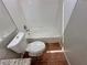 Cozy bathroom featuring a toilet next to a shower and tub combination at 316 Lingering Ln, Henderson, NV 89012