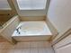 Bright bathroom featuring a soaking tub under a window and a glass shower at 316 Lingering Ln, Henderson, NV 89012