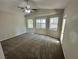 Spacious carpeted bedroom with high ceilings and plenty of natural light at 316 Lingering Ln, Henderson, NV 89012
