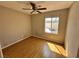 Bedroom with wood flooring and a window at 316 Lingering Ln, Henderson, NV 89012