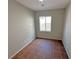 Simple bedroom with tile floor and a window providing natural light at 316 Lingering Ln, Henderson, NV 89012