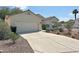 A charming single-story home with a two-car garage and xeriscaping, promoting water conservation at 316 Lingering Ln, Henderson, NV 89012