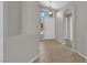 Inviting foyer with tiled flooring, neutral paint, and a view of the home's interior at 3228 Jumping Hills Ave, Henderson, NV 89052