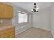 Bright kitchen area with modern lighting and plenty of space to eat at 3228 Jumping Hills Ave, Henderson, NV 89052