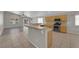 Open kitchen featuring tile floors, wrap around countertop, and stainless steel appliances at 3228 Jumping Hills Ave, Henderson, NV 89052