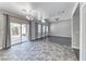 Bright living room with sliding glass doors leading to the backyard at 3425 Bedfordshire Pl, Las Vegas, NV 89129