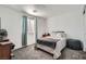 Cozy bedroom featuring carpet floors, natural light and a comfortable bed with stylish bedding at 377 Yellow Finch Ln, Henderson, NV 89012
