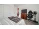 Bright bedroom featuring neutral tones, an open door, and modern furnishings at 377 Yellow Finch Ln, Henderson, NV 89012