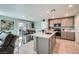The open-concept living area shows kitchen, dining, and living areas together at 377 Yellow Finch Ln, Henderson, NV 89012
