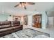 Bright, open-concept living space blending a cozy seating area with a stylish kitchen and dining setup at 377 Yellow Finch Ln, Henderson, NV 89012