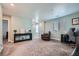 Cozy loft with carpet flooring, offering a versatile space for relaxation or a home office setup at 377 Yellow Finch Ln, Henderson, NV 89012