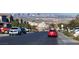 Street view of a quiet neighborhood street offering views of the Las Vegas skyline at 377 Yellow Finch Ln, Henderson, NV 89012