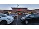 Close up image of a neighborhood shopping center with many parking spots available at 377 Yellow Finch Ln, Henderson, NV 89012