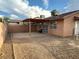 Large backyard with a covered patio and plenty of open space at 3936 Rive Gauche St, Las Vegas, NV 89115