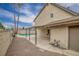 Backyard features a covered patio, gravel, block wall and a swimming pool at 4431 El Campana Way, Las Vegas, NV 89121