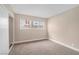 Neutral bedroom with large window, closet and plush carpeting offers a soothing retreat at 4431 El Campana Way, Las Vegas, NV 89121
