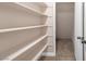 Walk-in closet with built-in shelving for optimal organization and storage at 4431 El Campana Way, Las Vegas, NV 89121