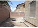 Backyard area with a block wall and minimal landscaping at 4825 Shea Stadium Ave, Las Vegas, NV 89139