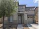 Charming two-story home with a well-manicured front yard and attached garage at 4825 Shea Stadium Ave, Las Vegas, NV 89139