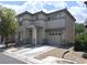 Attractive two-story residence with a tidy landscape and covered front porch at 4825 Shea Stadium Ave, Las Vegas, NV 89139