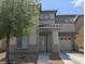 Charming two-story home with a well-maintained yard and covered entryway at 4825 Shea Stadium Ave, Las Vegas, NV 89139