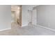 This bedroom features neutral walls, carpet flooring, and an ensuite bathroom at 4860 Nara Vista Way # 104, Las Vegas, NV 89103