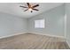 Large light blue primary bedroom with vaulted ceiling and fan at 5129 Midnight Oil Dr, Las Vegas, NV 89122