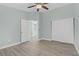 Spacious bedroom featuring a ceiling fan, closet and light blue painted walls at 5129 Midnight Oil Dr, Las Vegas, NV 89122