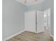 Light blue bedroom with closet and view to bathroom at 5129 Midnight Oil Dr, Las Vegas, NV 89122