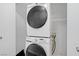 Conveniently stacked washer and dryer unit for efficient laundry space at 5129 Midnight Oil Dr, Las Vegas, NV 89122