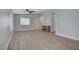 Inviting living room with neutral tones, modern floors, and a cozy fireplace at 5129 Midnight Oil Dr, Las Vegas, NV 89122