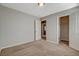 Comfortable bedroom features neutral walls, plush carpeting and a walk-in closet at 5309 Tartan Hill Ave, Las Vegas, NV 89141