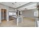Modern kitchen features stainless appliances, granite counters, and open concept at 5309 Tartan Hill Ave, Las Vegas, NV 89141