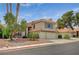 Attractive two-story home featuring desert landscaping, and a spacious two-car garage with a tile roof at 5609 Indian Ridge Dr, North Las Vegas, NV 89031