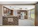 Well-lit kitchen featuring stainless steel appliances, granite countertops, and ample cabinet space at 5609 Indian Ridge Dr, North Las Vegas, NV 89031